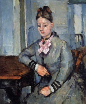 Paul Cezanne Painting - Madame Cezanne apoyada en una mesa Paul Cezanne
